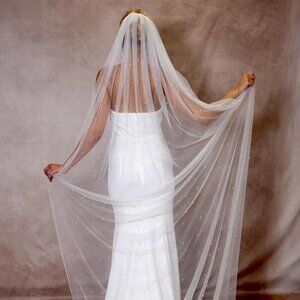 Light ivory cathedral length wedding veil with pearls